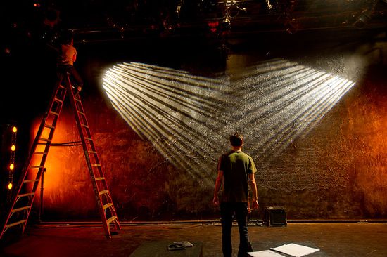 Electrician Margaret Lorenzi (CFA'16), atop the ladder, and Associate Lighting Designer Alex Fetchko (CFA'15) put the finishing touches on the lighting for CFA's upcoming For Colored Girls at CFA March 17, 2014. For Colored Girls Who Have Considered Suicide With The Rainbow Is Enuf opens Friday night and runs through the weekend.