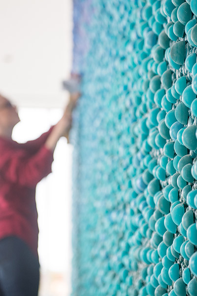 Artist Carson Fox builds her art installation Blue Green Brainbow at the Rajen Kilachand Center for Integrated Life Sciences & Engineering, Boston University's new interdisciplinary research and science building