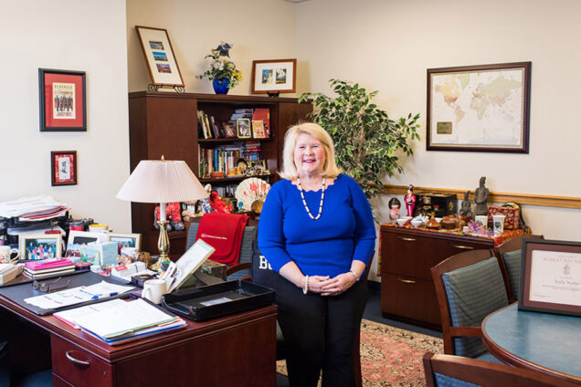 BU’s dean of admissions shows souvenirs she’s collected from traveling the world meeting hopeful applicants.