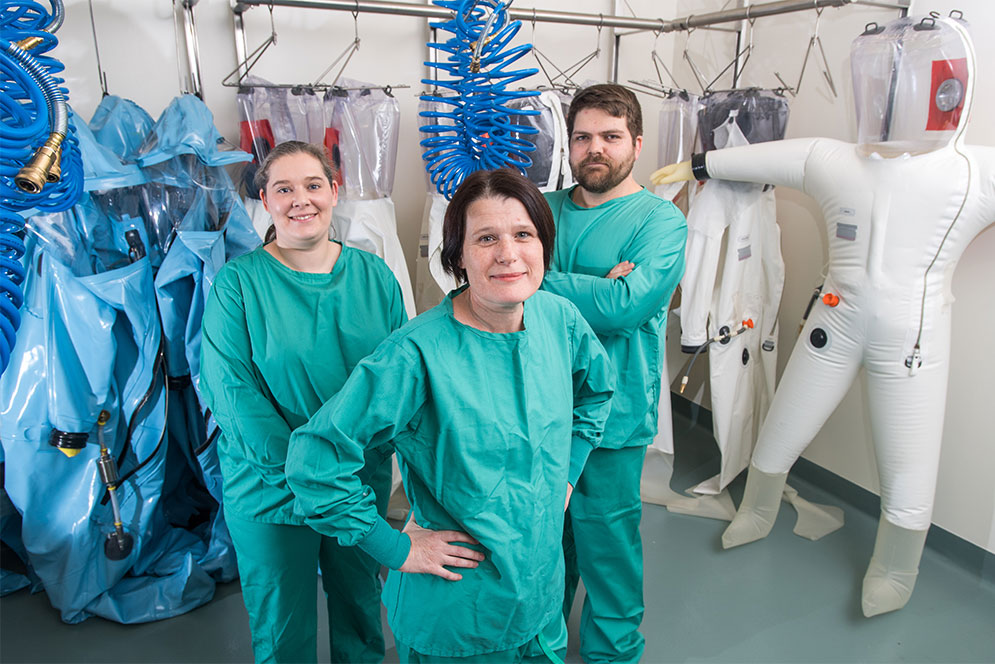 Biosafety Level 4 (BSL-4) researchers at Boston University's National Emerging Infectious Diseases Laboratories (NEIDL) Judith Olejnik, Elke Mühlberger, and Adam Hume