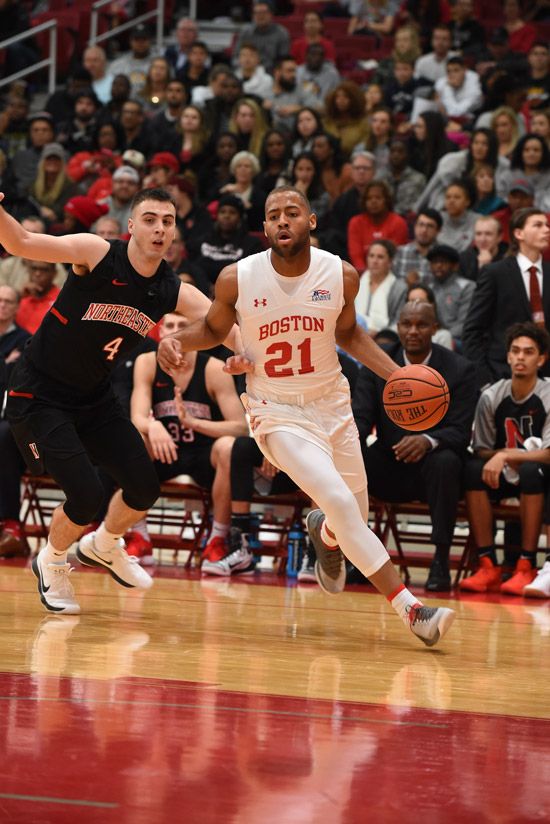 Hankerson dribbles down the court during a game against Northeastern. 