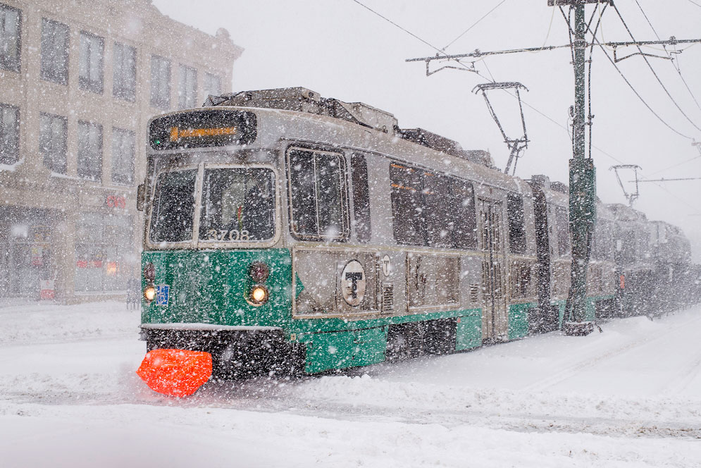 Green line train in snow