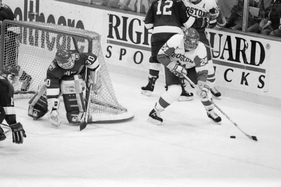 Keith Tkachuk (CAS’96) spins around near the Harvard net during the Beanpot first round, where the Terriers defeated Harvard 8-2 on February 4, 1991. Photo by Kalman Zabarsky