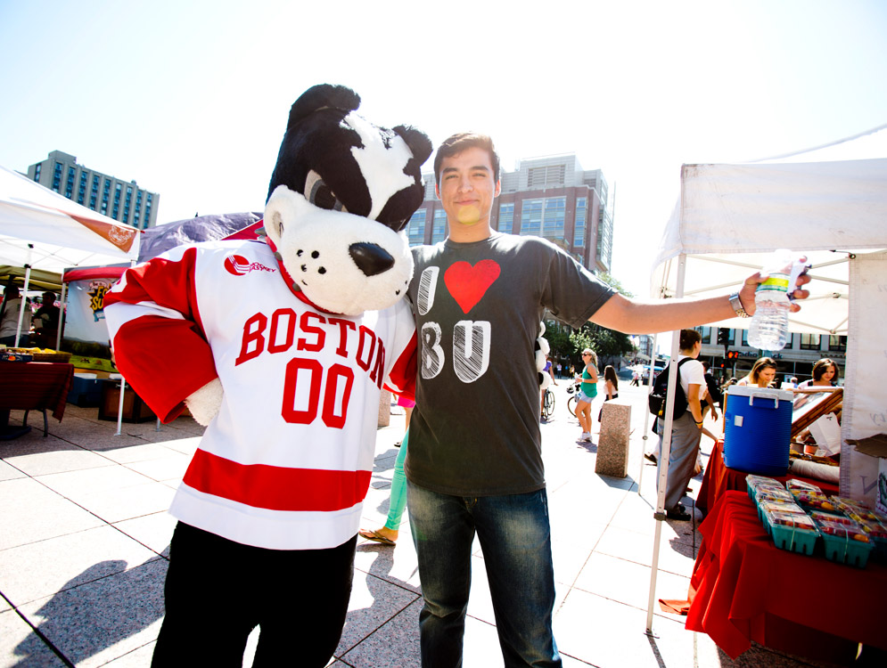 Rhett hangs with a student at the BU Sustainability Festival in 2012.