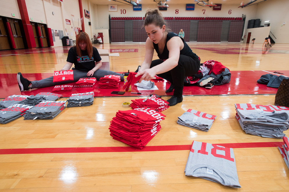 The dance team sells T-shirts to raise money for the annual trip to Nationals.
