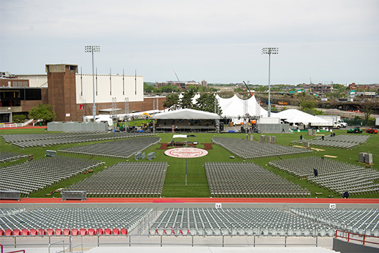Facilities crews set up Nickerson Field for Boston Univesity's 145th All-University Commencement.