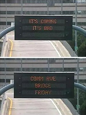 A digital sign over the Massachusetts Interstate reads It's Coming, It's Bad, Comm Ave Bridge Friday