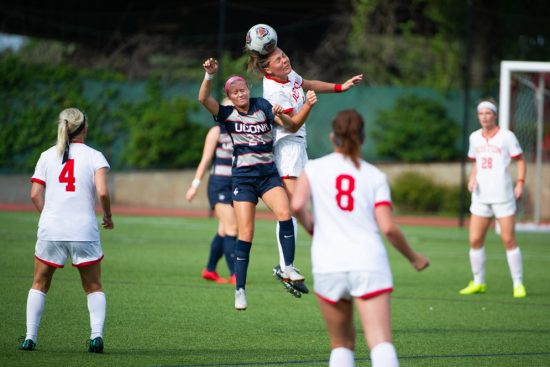BU's Taylor Kofton (SAR'22) goes up for a header during the Women's Soccer matchup between Boston University and the University of Connecticut at Nickerson Field