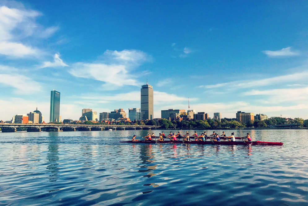 The BU women’s rowing lighweight team practicing on the Charles River