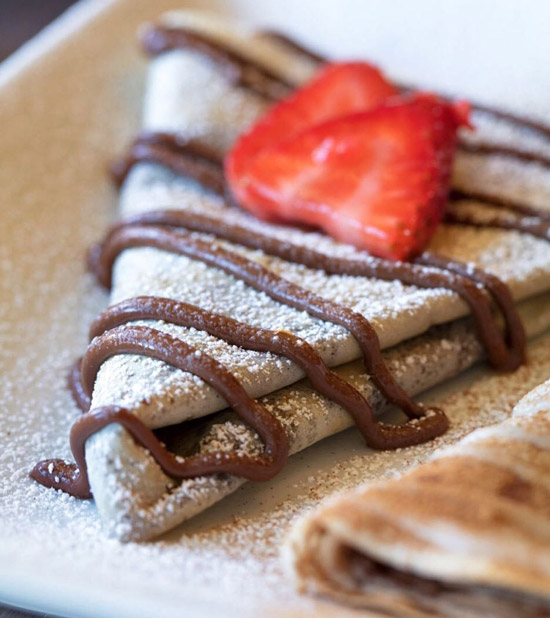 Nutella chocolate crepe with fresh strawberries