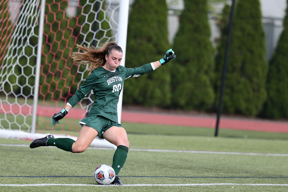 Goalie Morgan Messner punts the ball