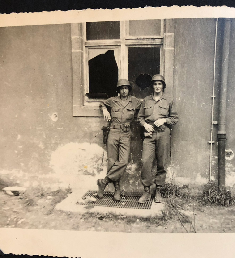 John Waller and an unidentified comrade in war-torn France, early 1945.