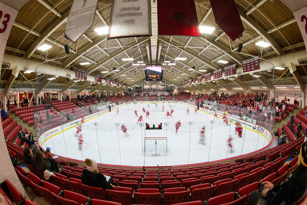 Wide shot of Harvard University's Bright-Landry Hockey Center while the Harvard Crimson and Boston University women's ice hockey teams warm up for the 41st Annual Women's Beanpot Tournament final.