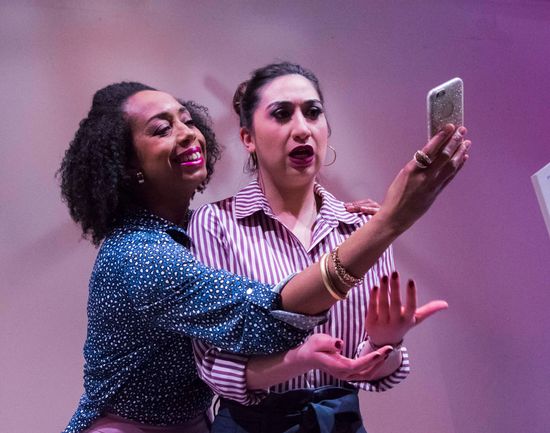 Jackie Davis and Krystal Hernandez as mother and daughter in Alexis Scheer’s Laughs in Spanish at Boston Playwrights’ Theatre. Photo by Kalman Zabarsky