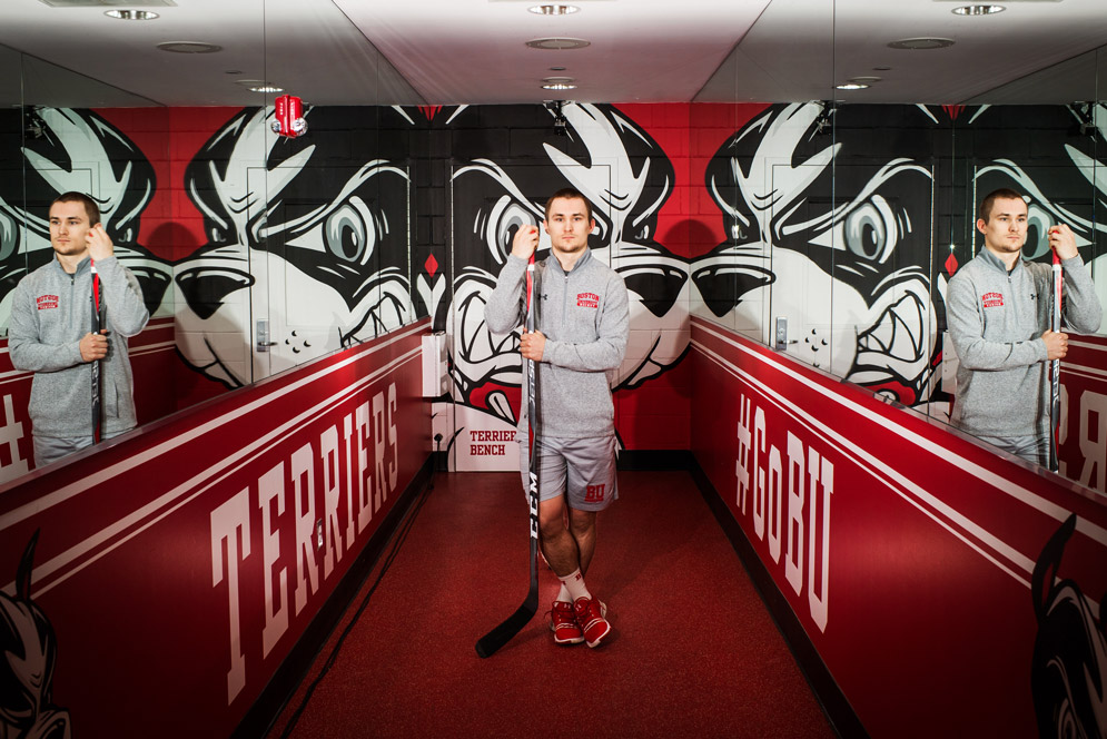 Bobo Carpenter poses for a portrait with his hockey stick