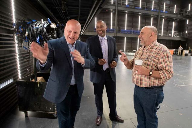School of Theater Director Jim Petosa, at right, and CFA Dean Harvey Young, at center, chat with Mitch Landrieu, mayor of New Orleans April 10, 2019 at Booth Theater.