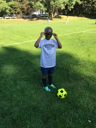 Leo playing soccer