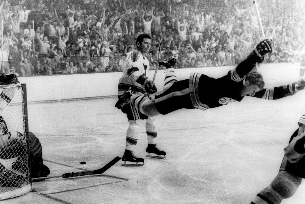 In this May 10, 1970, file photo, Boston Bruins' Bobby Orr flies through the air after scoring the winning goal past St. Louis Blues' goalie Glenn Hall during overtime in the NHL hockey Stanley Cup finals in Boston.