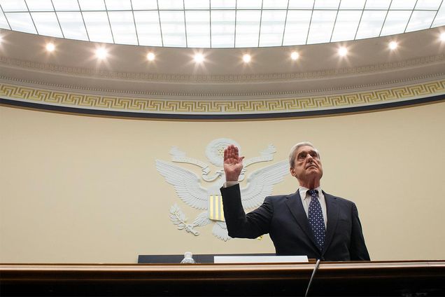 FBI Director Robert Mueller swears to testify under oath before the Congressional hearing committee.