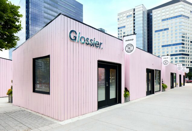 Exterior view of the Glossier pop-up store in the Seaport district of Boston.