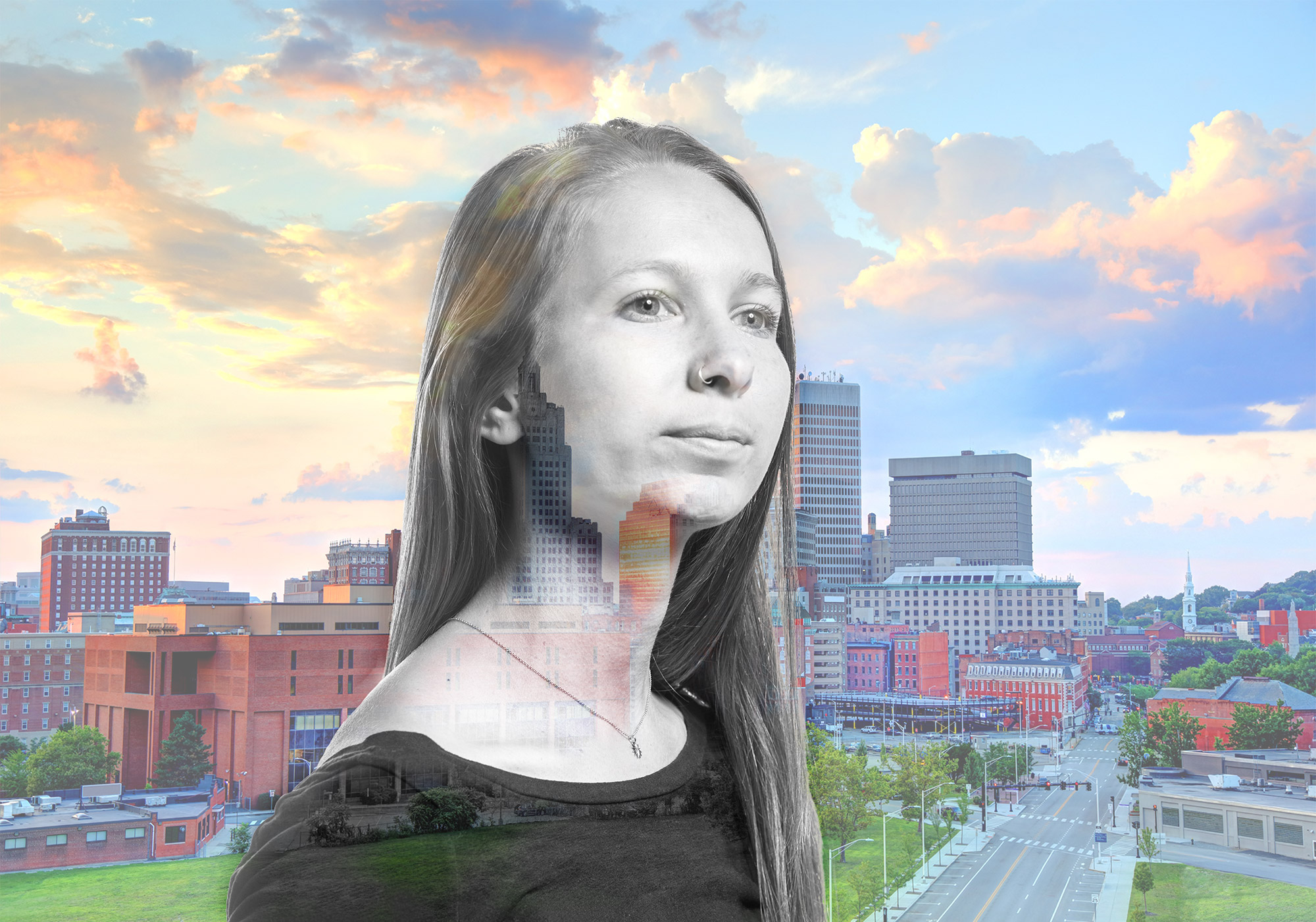 Double exposure portrait of Paige Brochu with the Providence, Rhode Island skyline in the background.