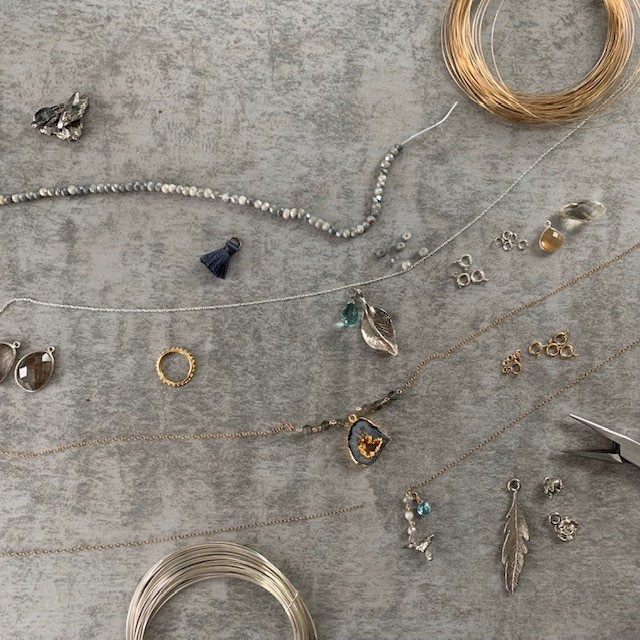 Various pieces of jewelry displayed on a table.