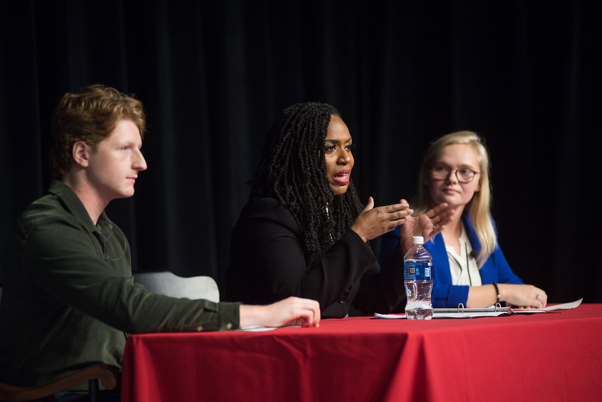 ayanna pressley addresses the crowd at a Boston University town hall.