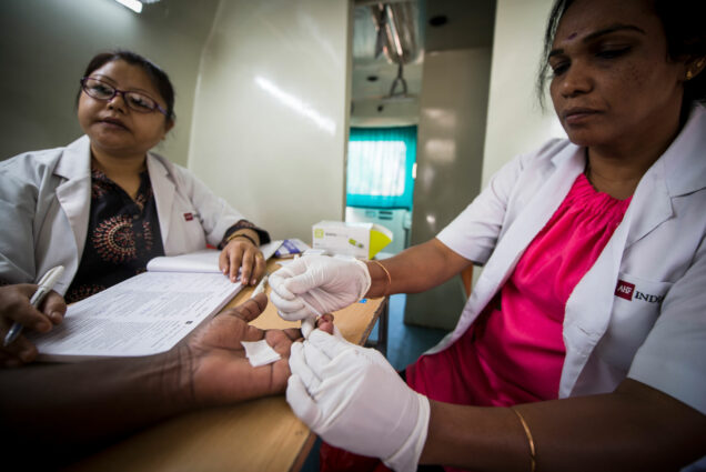 two nurses conduct a blood test for aids in Faridabad