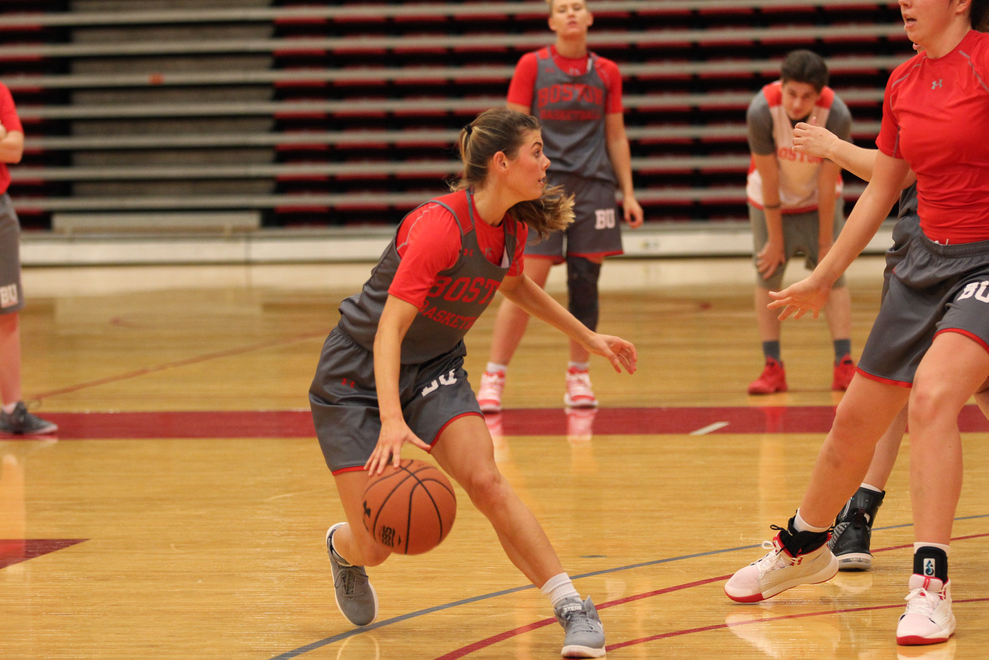 Katie Nelson (CGS’19, Questrom’21) dribbles a basketball