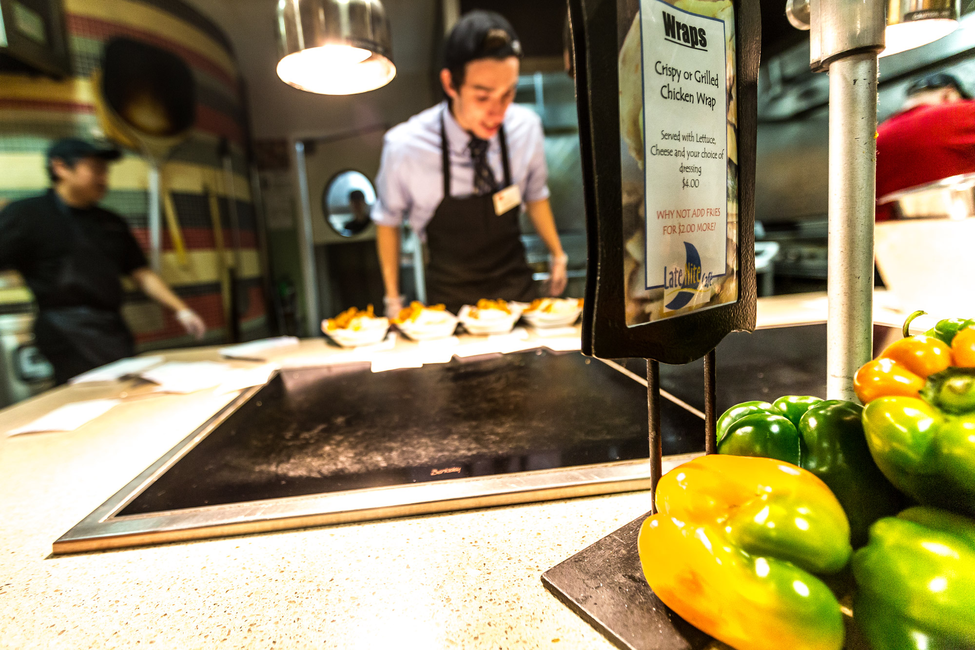 A worker prepares food at Warren Late Night Cafe