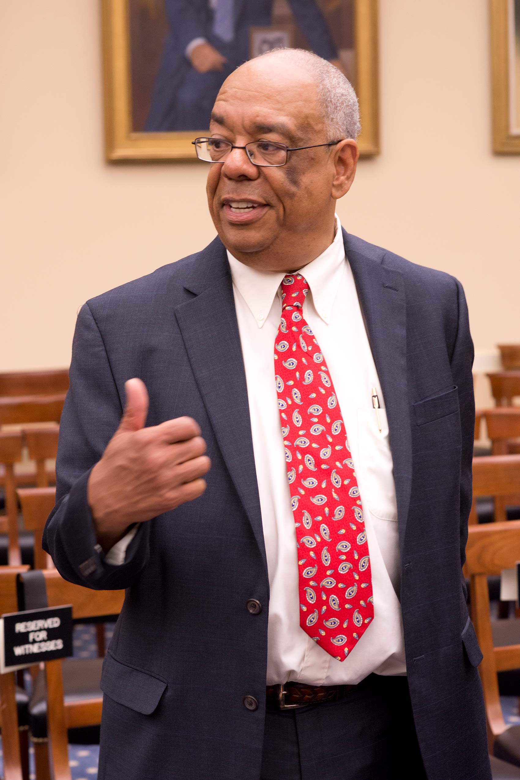 Roscoe Giles in a congressional hearing room after testifying before congress.