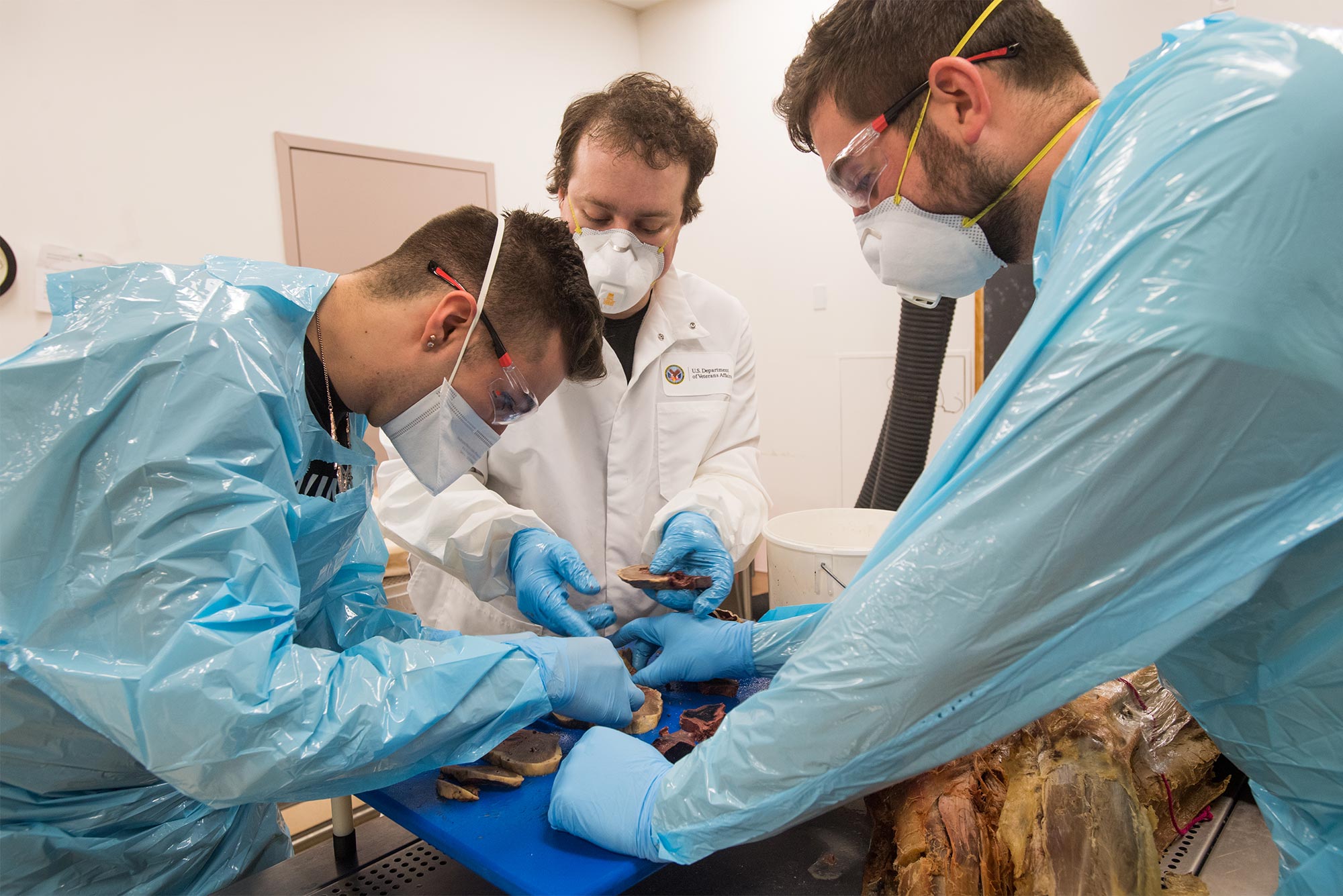 Dissection instructor Daniel Kirsch leads graduate students in the dissection of a human heart in the Boston University Cadaver Lab advanced anatomy class.