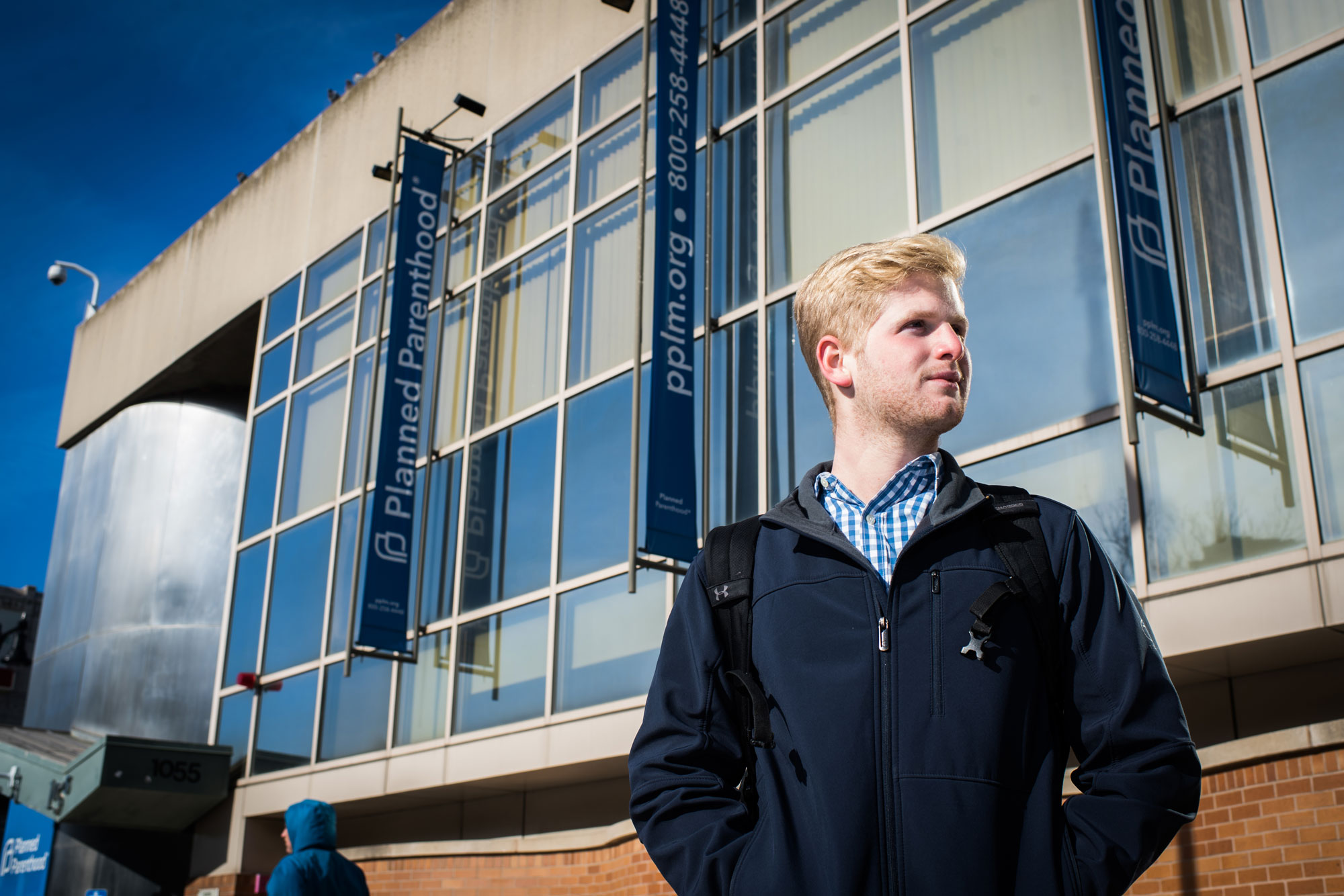 Lev Paasche-Orlow (CAS’22) poses for a photo outside of planned parenthood