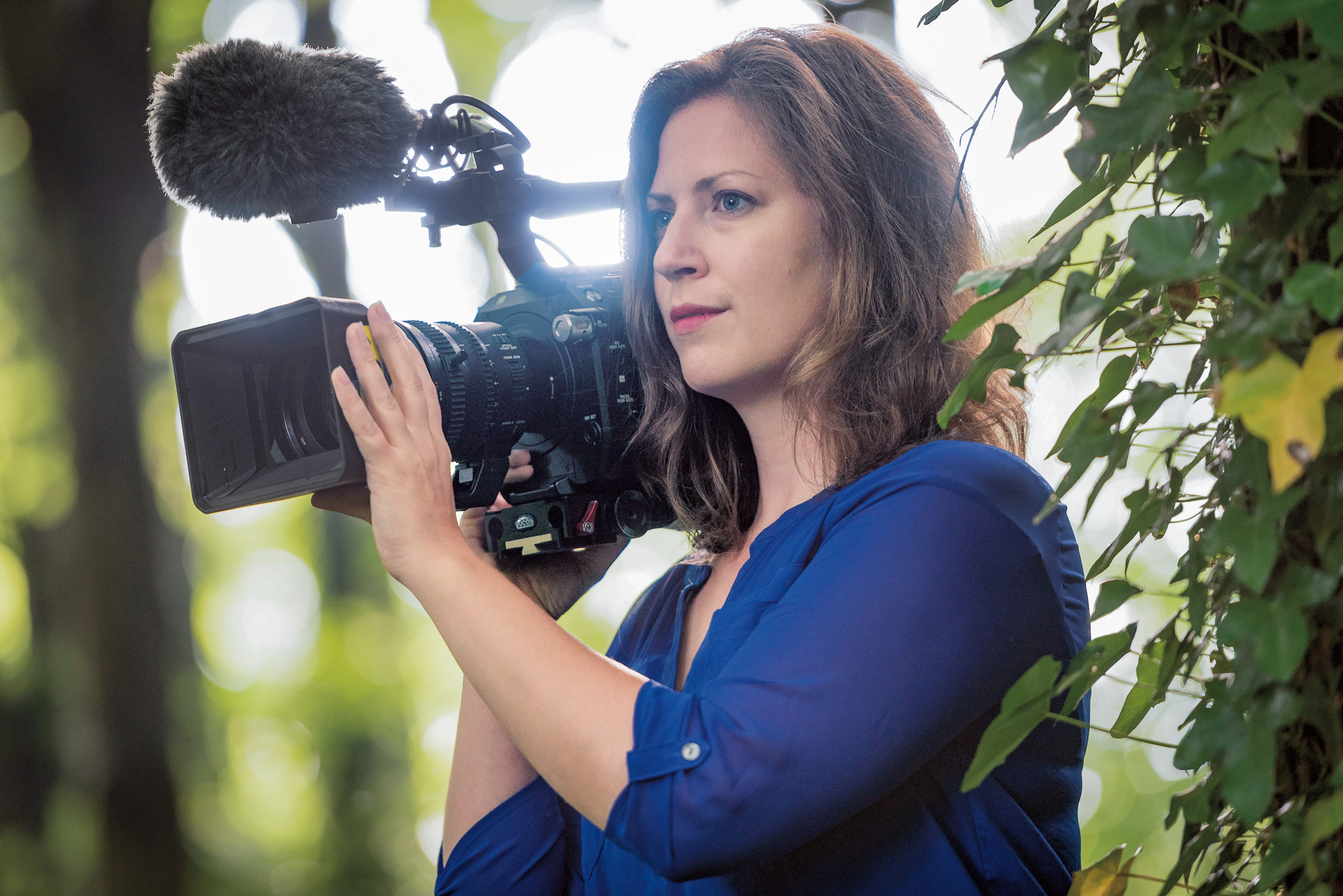 Lindsey Parietti holds a video camera.