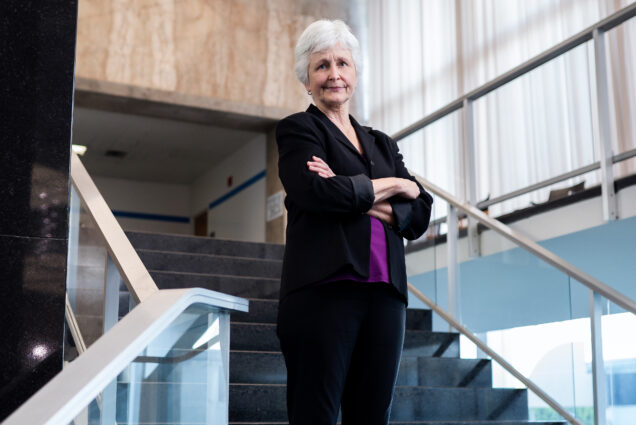 Senior advisor at the US Department of State, Jane Sigmon poses for a photo on a set of stairs