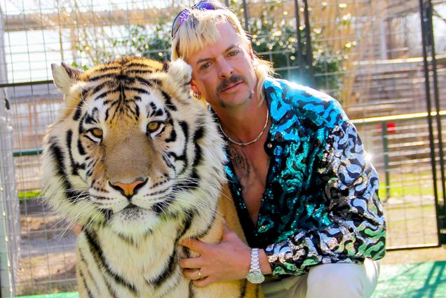 A photo of Joe Exotic and a tiger