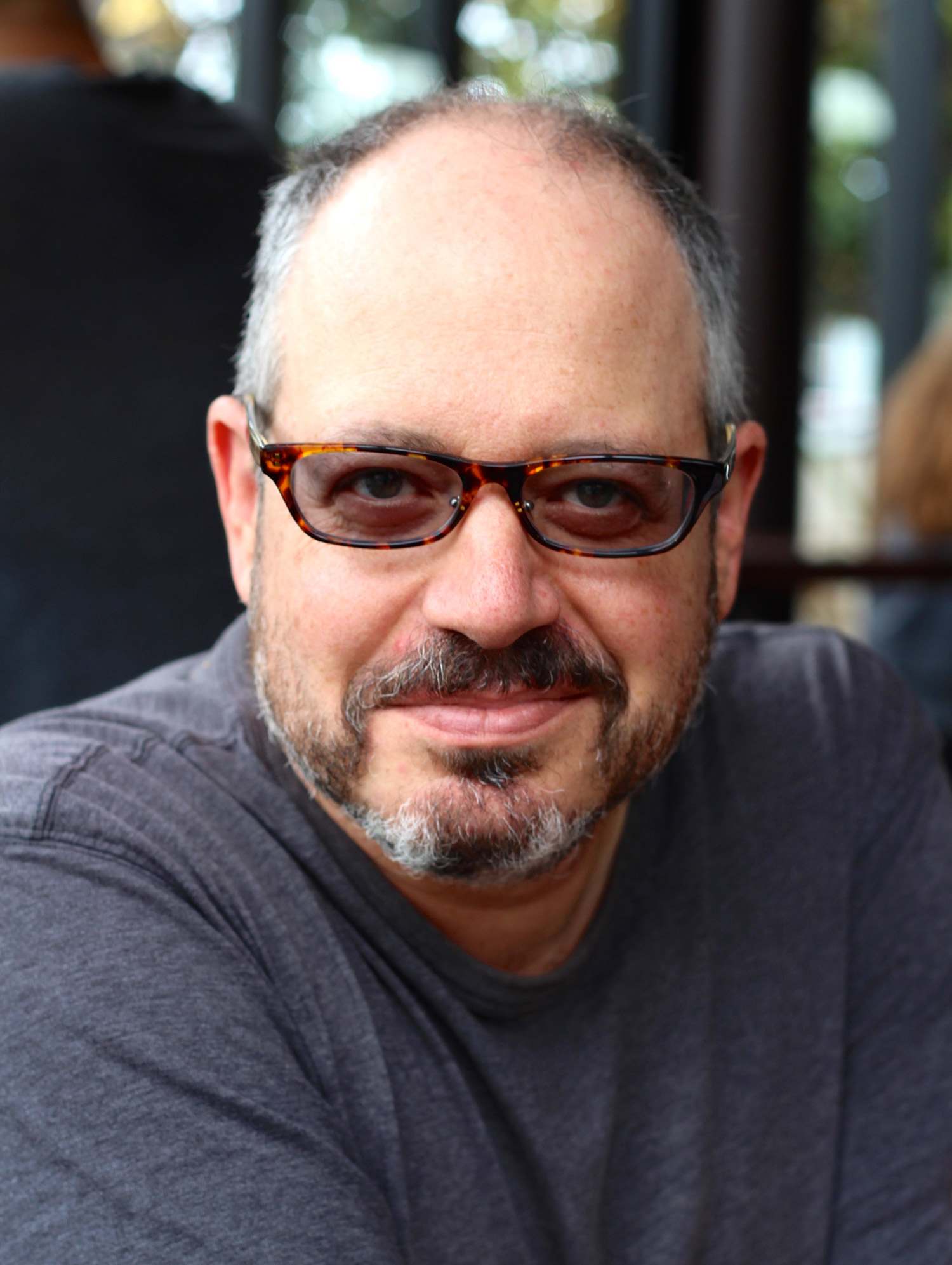Portrait of Crip Camp's film coeditor Andrew Gersh (COM’90).