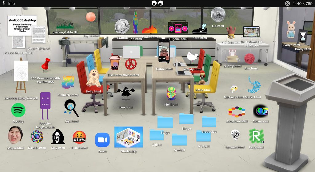 Screenshot of studio355.desktop, a collaborative virtual exhibition of sorts, created by Assistant Professor Mary Yang's Sophomore design class to share process, inspiration, and works in progress. The shot shows a group of table with colorful chairs around it, and then a series of random objects and folders float over the image as if it were a desktop screen.