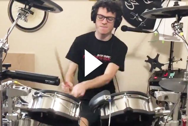 Screenshot of Gabriel Klavans (CAS'21) playing the drums during BU Scarlet Band's video "Shipping Up to Boston. Image with video play button overlay.