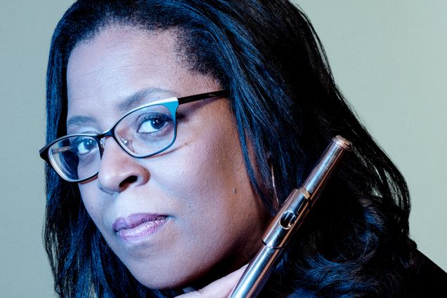 A portrait photo of Valerie Coleman with her flute