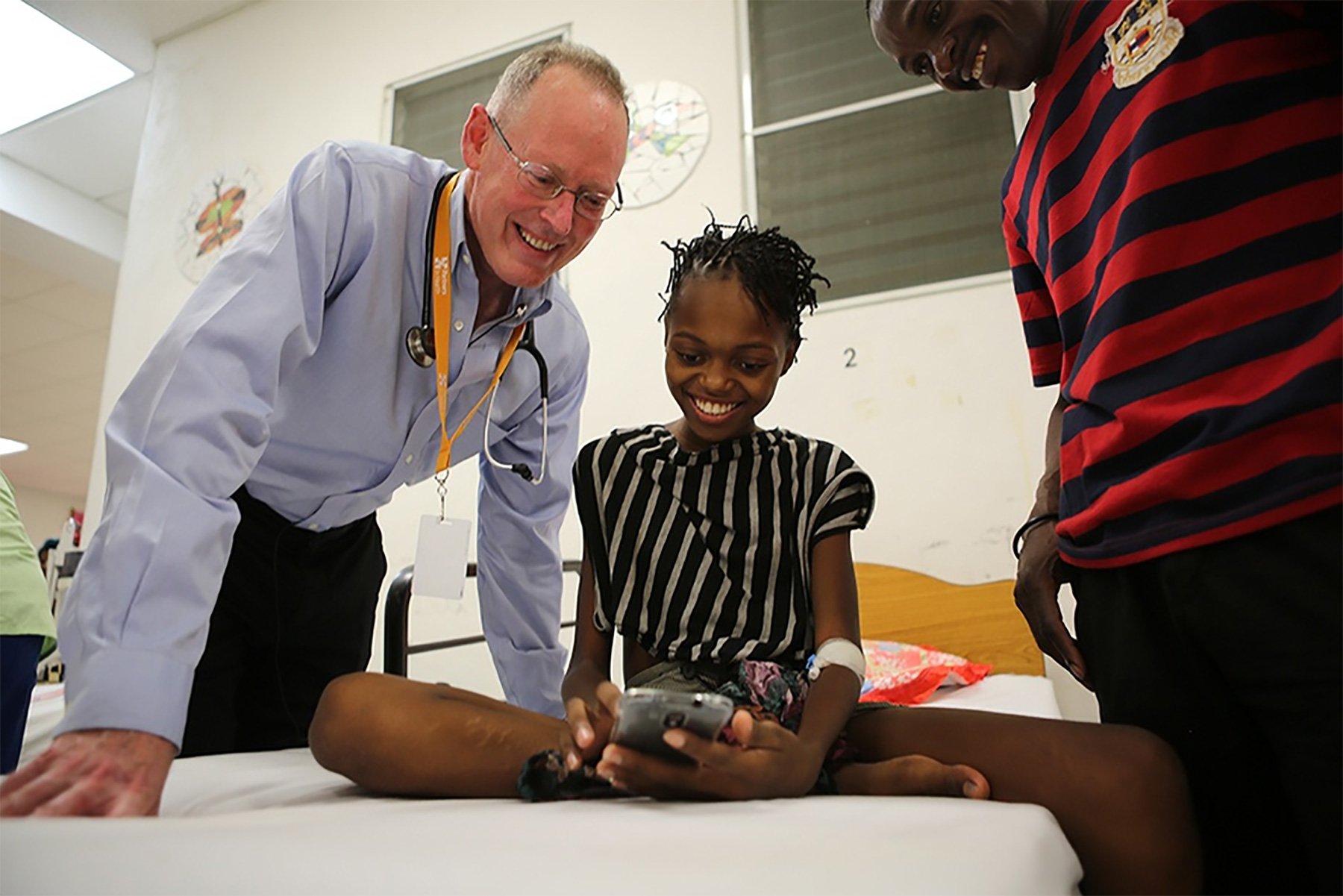 A photo of Paul Farmer conducting field work