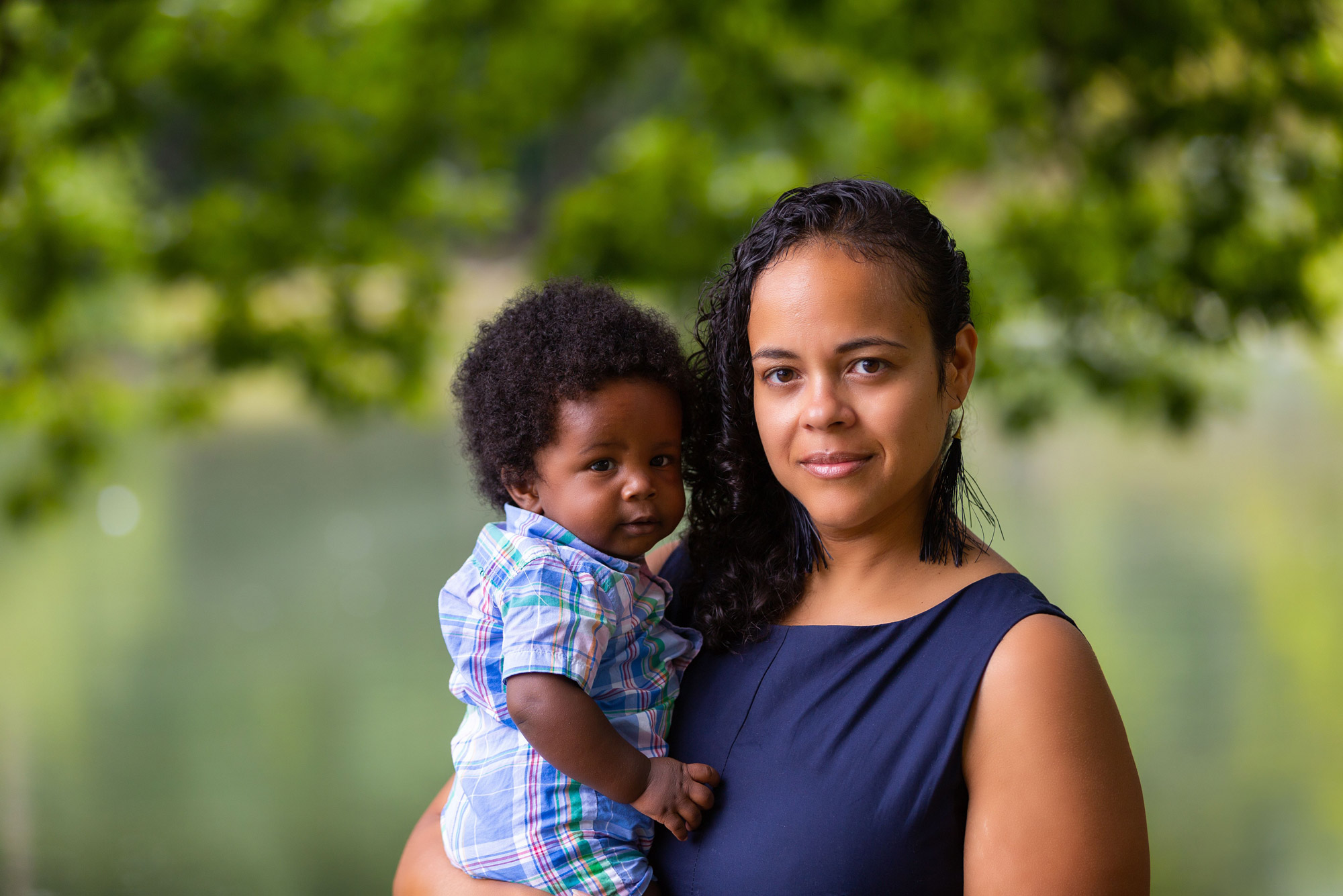 A photo of Leanne Yinusa-Nyahkoon holding her child