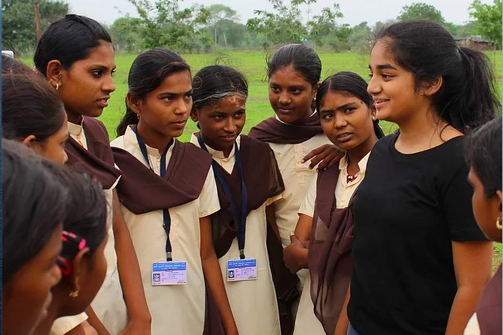  A photo of Sarina Zaparde talking with other uniformed girls "class =" wp-image-293579 "/>
<figcaption> Sarina Zaparde (CGS'22), here with some of the girls her organization helped, founded Dress to Learn, a non-profit organization that provides free school uniforms and shoes to orphaned girls in India, after of observing a staggering gender imbalance in rural schools in India. Photo courtesy of Zaparde </figcaption></figure><p> Growing up, Zaparde visited his father's native village in central India every year, where he observed the obstacles girls his age faced in attending school . That's if they could go first: In rural India, it is not uncommon for families to fund a son's education, but not a daughter's, by keeping girls at home for domestic and agricultural work. There is also the threat of being sold as sex trafficking or servitude, to which poor and isolated women and girls are particularly vulnerable. Zaparde realized that having access to education could have a great impact on a girl's future</p><p>.</p><p> Arriving home from one of those high school trips, Zaparde had an idea. With the help of her parents, she founded Dress to Learn, a non-profit organization that provides free school shoes and uniforms to orphaned girls in rural India. As its website explains, schoolchildren in India must wear uniforms to ensure fair treatment for all students, and the price of uniforms is often a barrier for girls, especially if they are orphans.</p><p> “I thought the least I could do was try to get uniforms [for these girls] so that they could complete their education within their village,” says Zaparde, explaining that simply donating money or school supplies is not 'It is useful because villagers often sell items donated or use funds for other purposes. "This way, they have to wear a uniform because it is for their own specific school."</p><p> The cost of a uniform and shoes is $ 7. Since 2016, Dress to Learn has partnered with approximately 75 school clubs across the country to host fundraisers, such as walks, car washes, and talent shows, and has donated uniforms to more than 1,000 girls. The uniforms are ordered from local tailors, "so we also help the town's economy," says Zaparde. Shoes are measured on site and distributed from the Dress to Learn supply. As boys get older, she does her best to ensure that the same groups of girls get larger sizes every two years.</p><div
class=