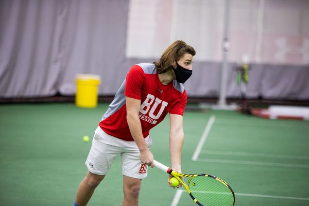 Pete Siozios prepares to serve the ball