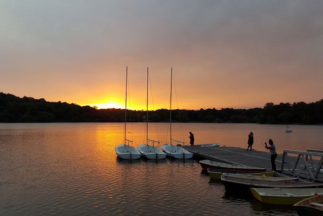 A photo of Jamaica Pond at sunset