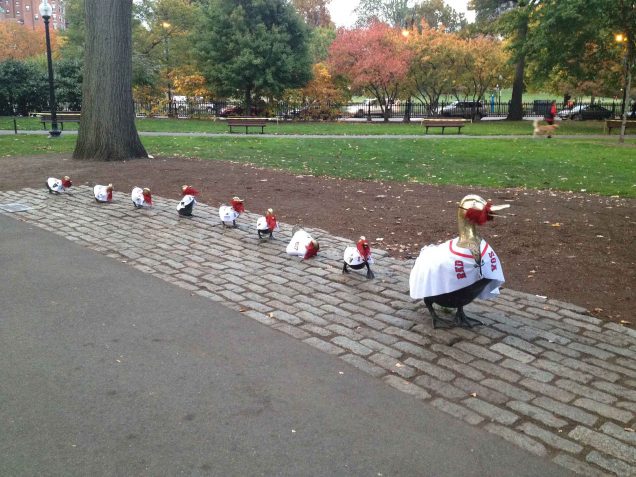 Nancy Schon's Make Way for the Ducklings sculpture in Boston decorated with all ducks wearing Boston Red Sox jerseys to celebrate winning the World Series.