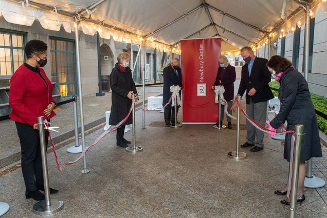 photo of the Newbury Center ceremonial ribbon-cutting in October 2020: Crystal Williams (from left), BU VP and associate provost for community and inclusion; Margaret Winslow, former Newbury College chair of trustees; Robert A. Brown, BU president; Jean Morrison, BU provost; former Newbury College trustee Ray Witkowski; and Karen Engelbourg, BU senior VP for development and alumni relations.