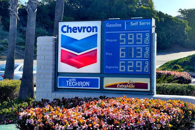 an image of a gas pump in california showing prices as high as 5.99/gallon for regular gasoline