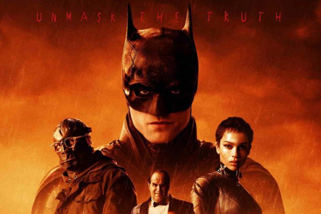 Movie poster for the Batman 2022 movie. The poster features the new cast, Robert Pattinson as Bruce Wayne (Batman), Zoë Kravitz as Selina Kyle (Catwoman), and Paul Dano as Edward Nashton (The Riddler). The poster has dramatic lighting with a yellow/orange tinge. At the top, "unmask the truth" is written in creepy red letters.