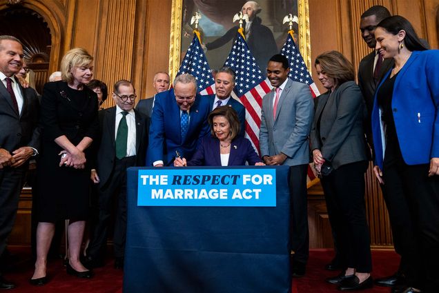 UNITED STATES - DECEMBER 8: Speaker of the House Nancy Pelosi, D-Calif., and Senate Majority Leader Charles Schumer, D-N.Y., conduct a bill enrollment ceremony after the House passed the Respect for Marriage Act in the U.S. Capitol on Thursday, December 8, 2022. The bill mandates federal protection for same-sex marriages. (Tom Williams/CQ Roll Call via AP Images)